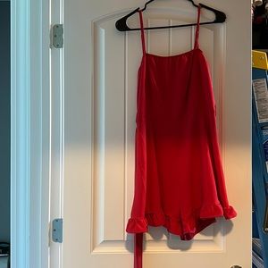 Red Romper with waist tie. Never worn. Size small